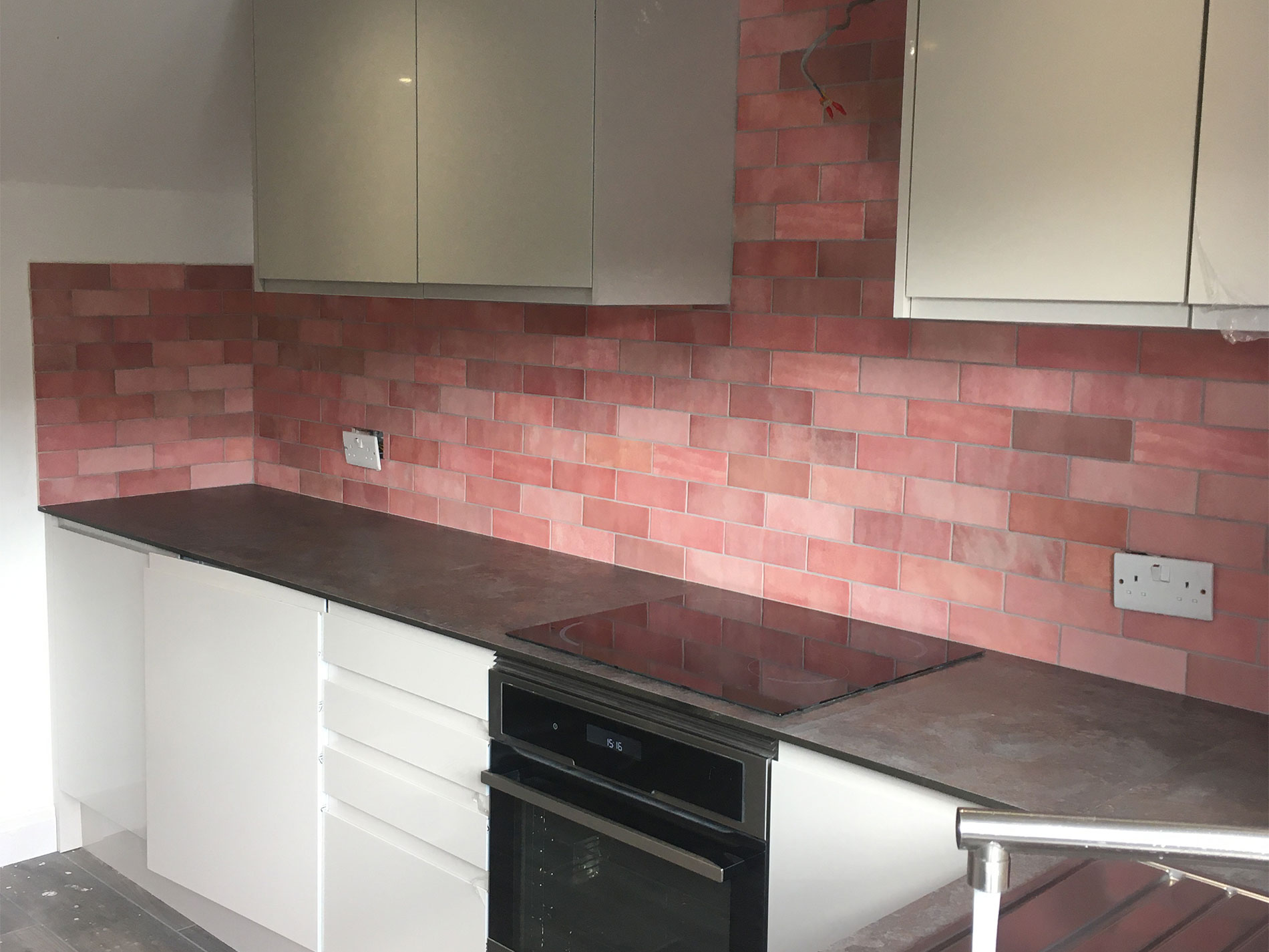 Tiled splash back wall in kitchen